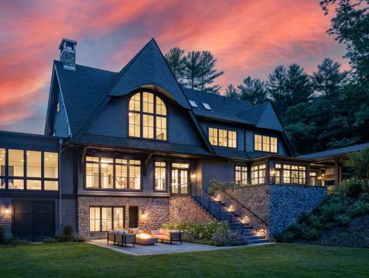 Dusk view of custom designed shingle style home Metrowest, MA 